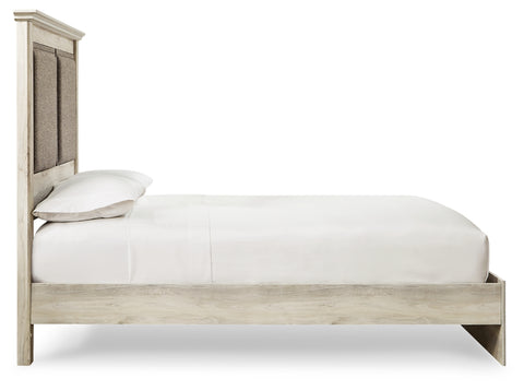 Cambeck King Upholstered Panel Bed with Dresser