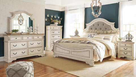 Realyn Queen Upholstered Panel Bed with Dresser